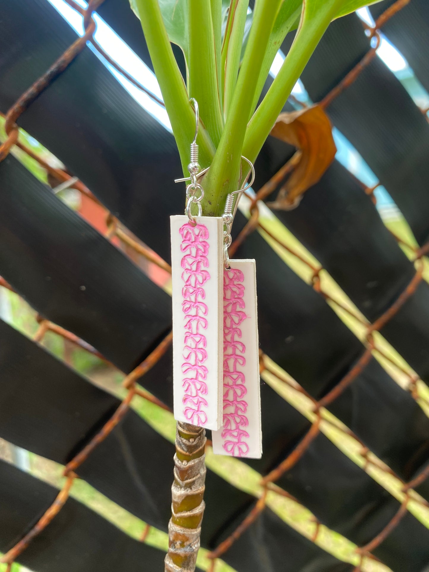 Pink on white Puakenikeni Bar earrings